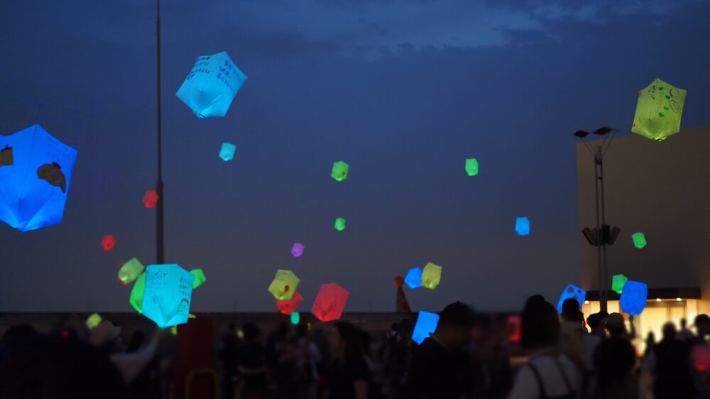 Paper lanterns are flying to the air with everyone's wish