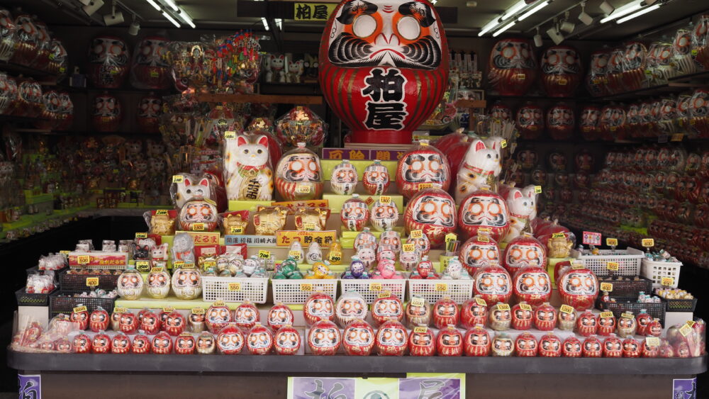 Beautiful display of Daruma dolls in a stall